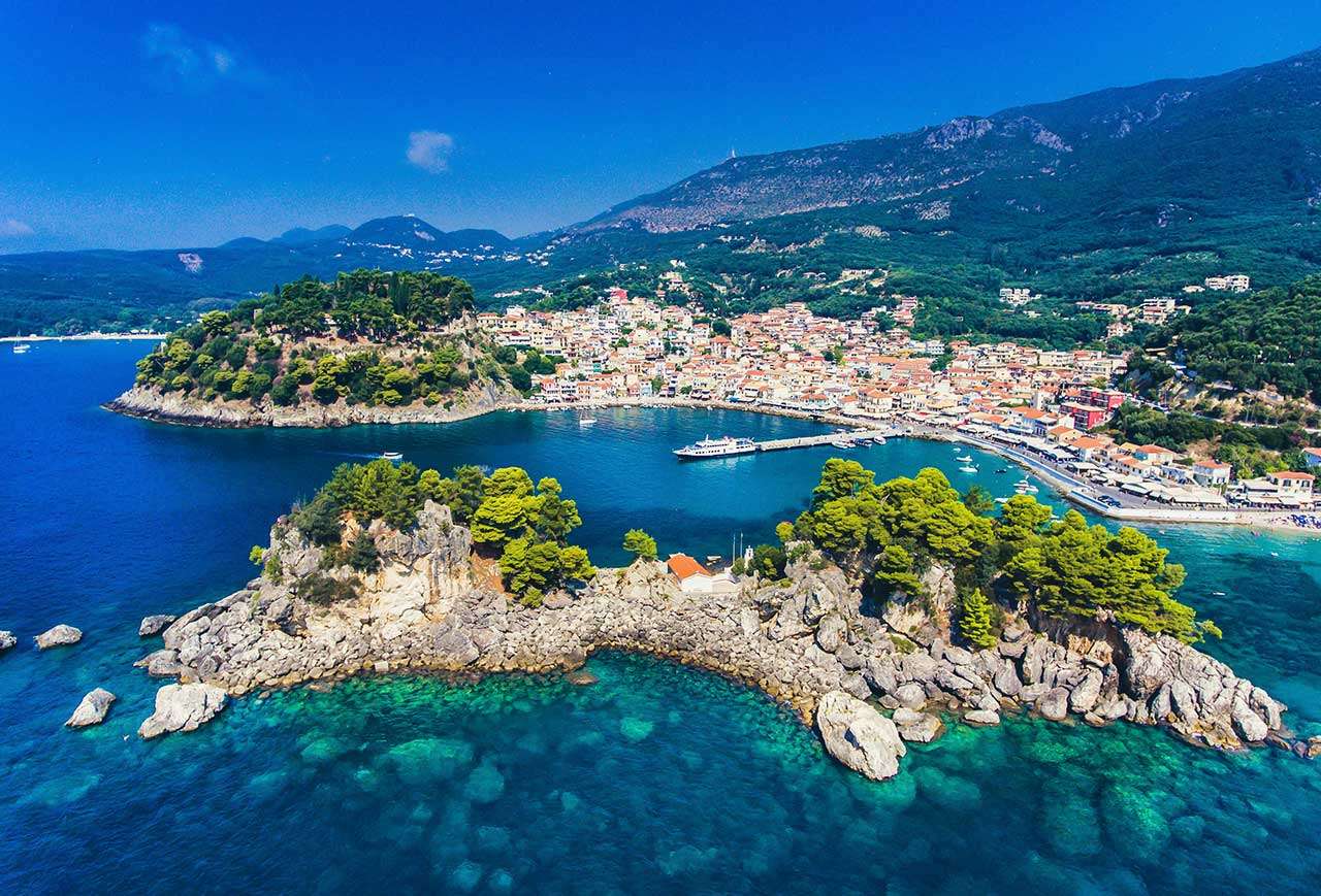 Aerial view of green trees and blue sea during daytime in Parga, Greece
