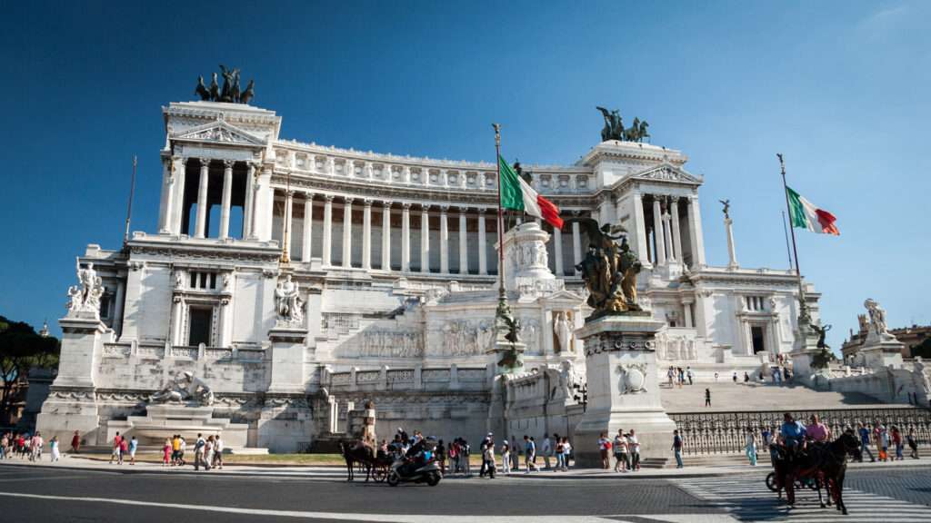 A low-angle view of the Altare della Patria in Rome