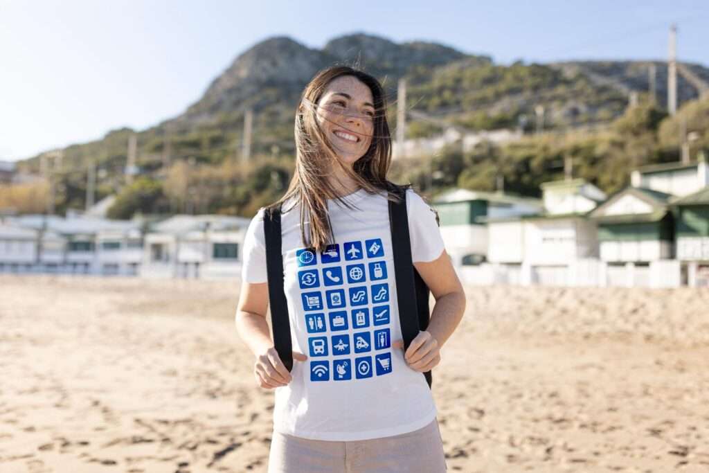 Young adult wearing travel icon shirt