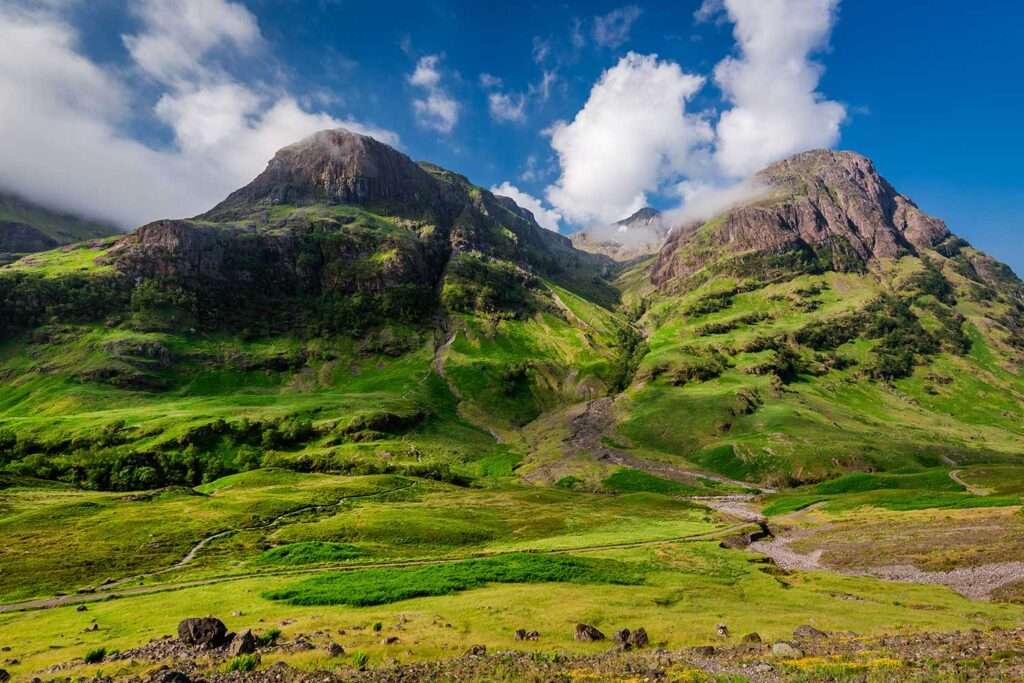 Mountains of Glencoe at sunrise in summer, Scotland