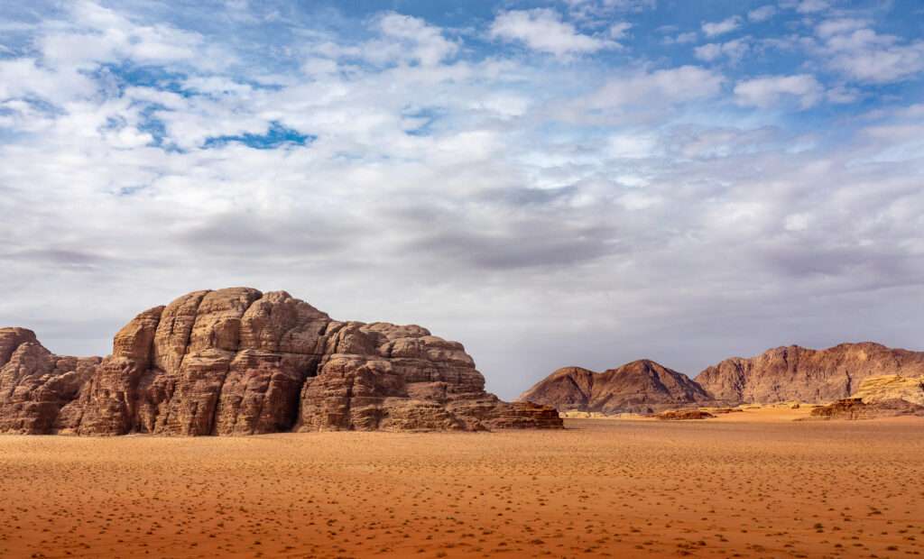 Red sand and rocks in the Wadi Rum desert in Jordan.