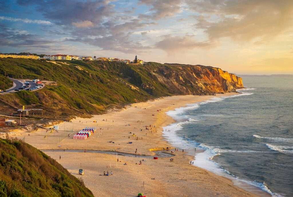Beautiful beach with cliffs and a small river. Paredes Vitoria beach in Nazaré, Portugal.